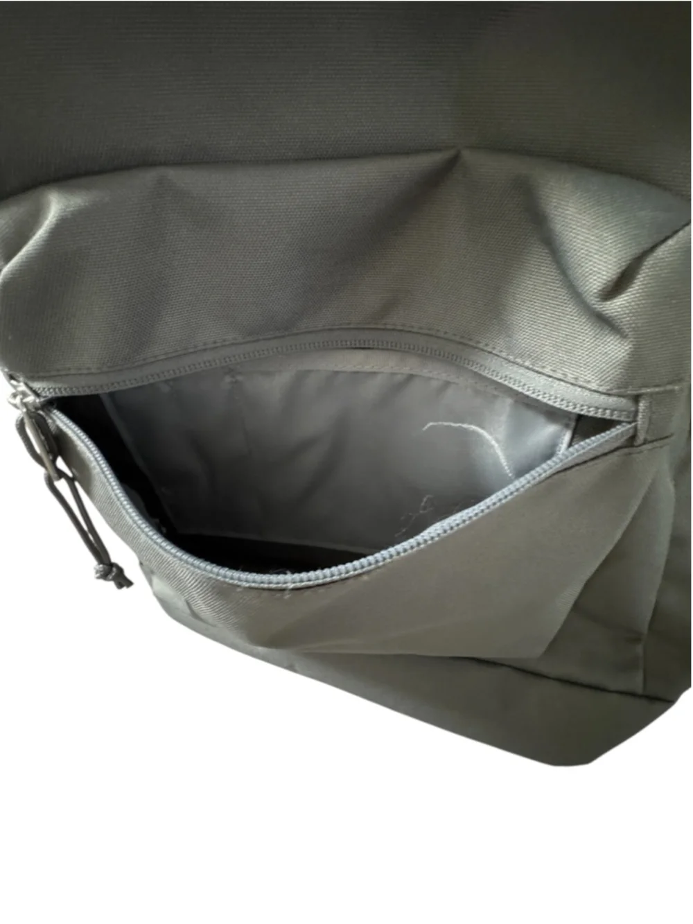 Jansport Grey Backpack with side pocket grey, top zip and front pocket. Light